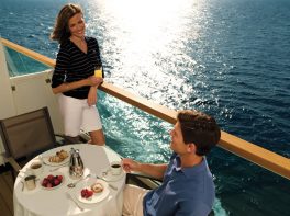 Seabourn Couple on Balcony having Breakfast