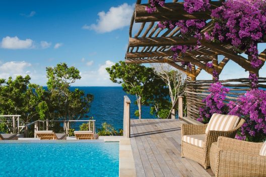 Kokomo Residence flowers by pool